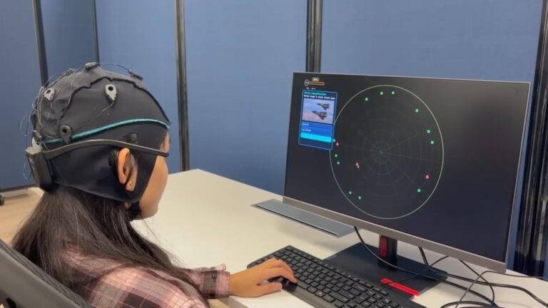 Brain Machine Interface-based Neurofeedback System for Enhancing Human Cognition in Military Training